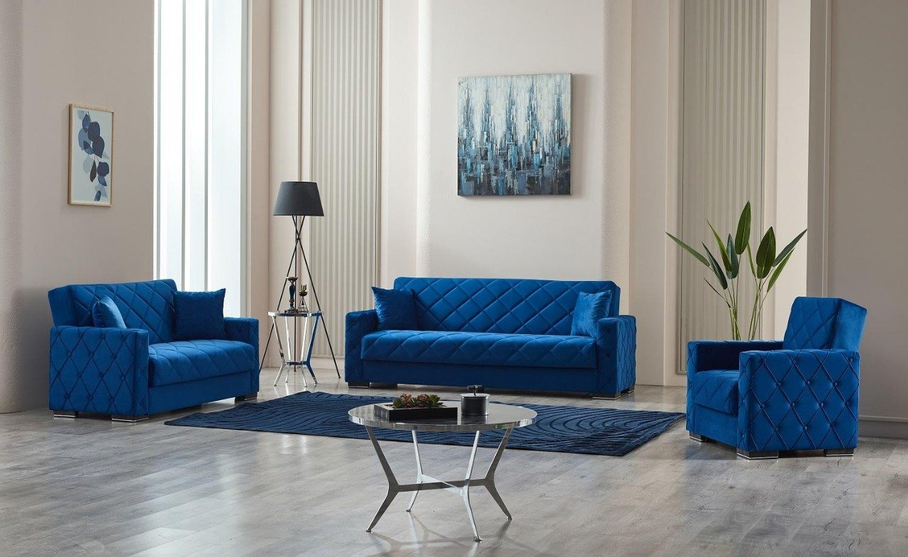 Modern living room with blue furniture and abstract painting.