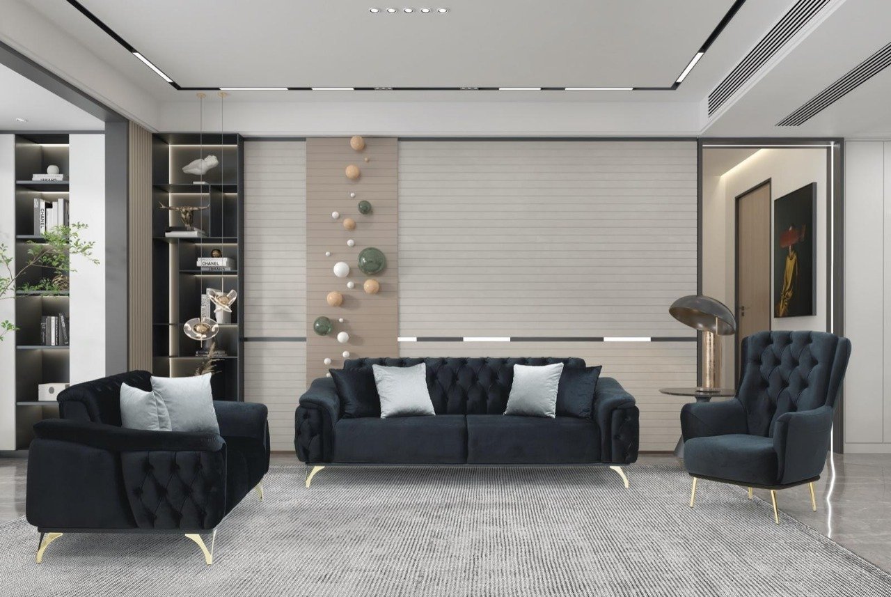 Modern living room with dark blue velvet furniture, a textured carpet, and a decorative wall installation.